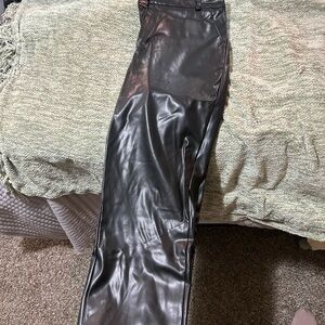 Black Wide Leg Pants with Glossy Finish and Smooth Texture